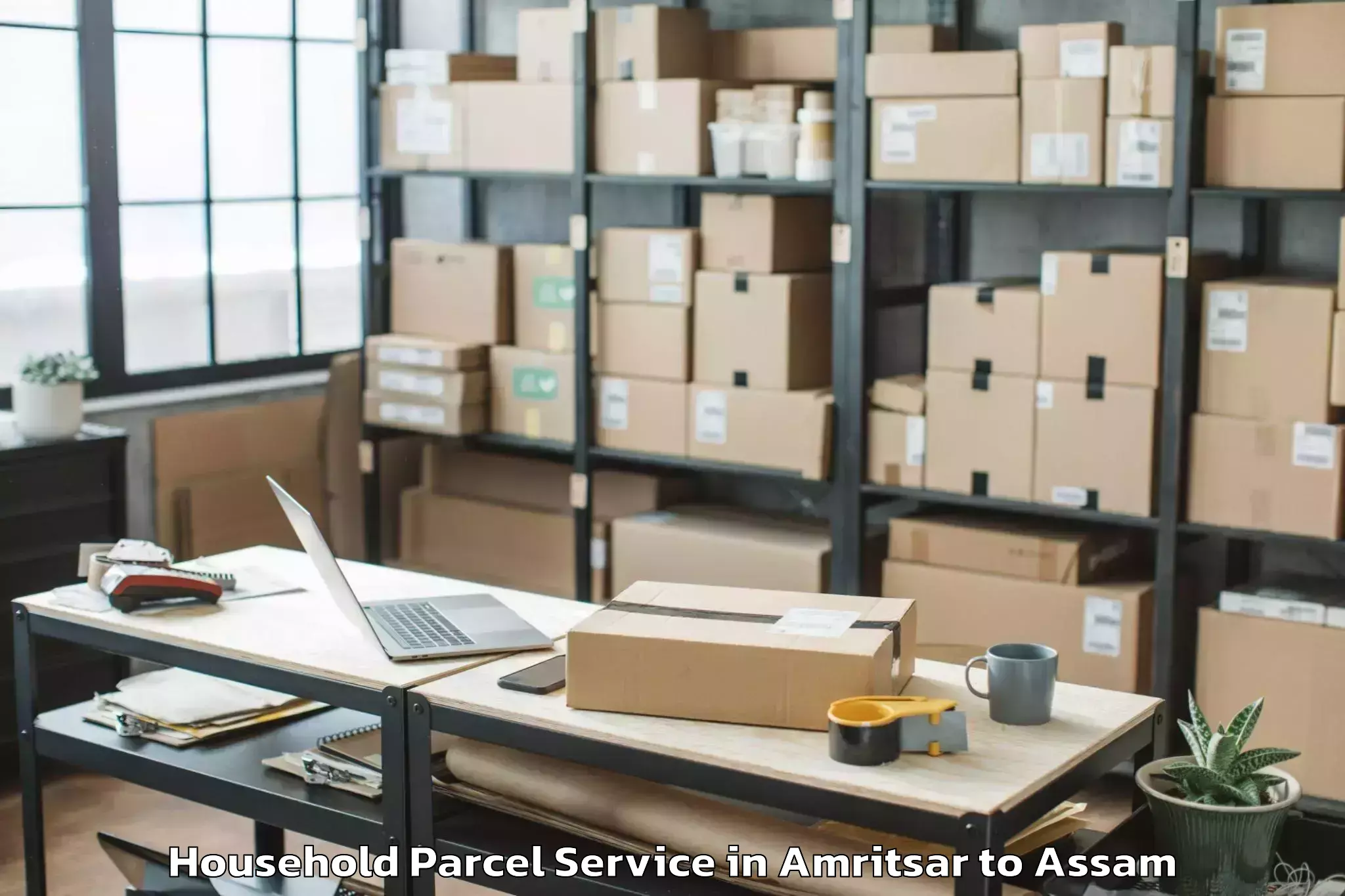 Book Amritsar to Pachim Nalbari Household Parcel Online